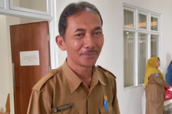 Kepala Dinas Sosial KLU, Fathurrahman. (Foto. kicknews.today/Anggi)