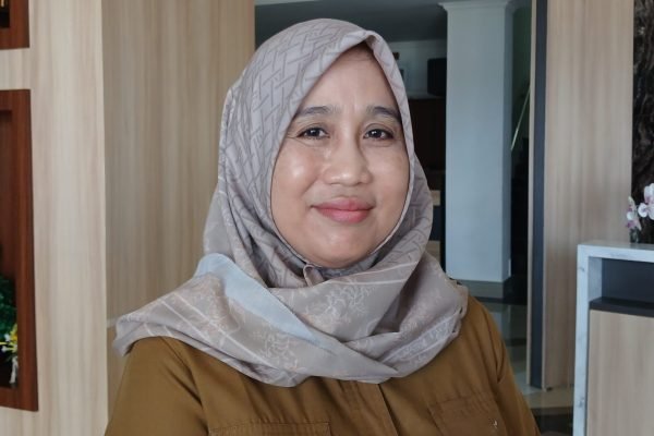 Kepala Dptmpsp-Naker, Evi Winarni. (Foto. kicknews.today/Anggi)