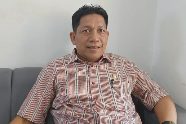 Kepala Bidang Pendataan dan Administrasi Desa (PADes) DP2KBPMD KLU, Marta Efendi. (Foto. kicknews.today/Anggi)