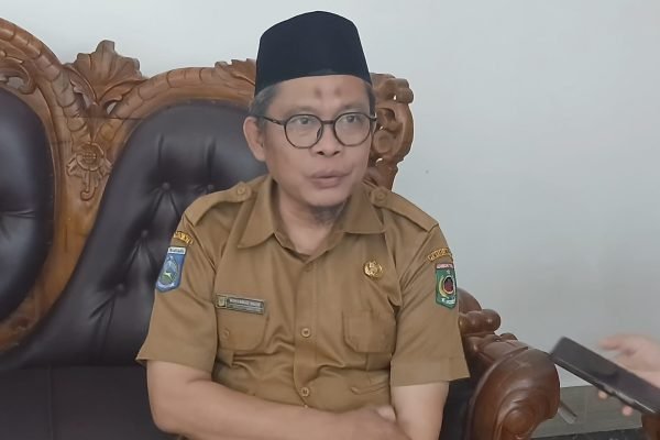 Kepala Dikbudpora KLU, M.Najib. (Foto. kicknews.today/Anggi)