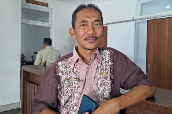 Kepala Dinsos PPPA KLU, Fathurrahman. (Foto. kicknews.today/Anggi)